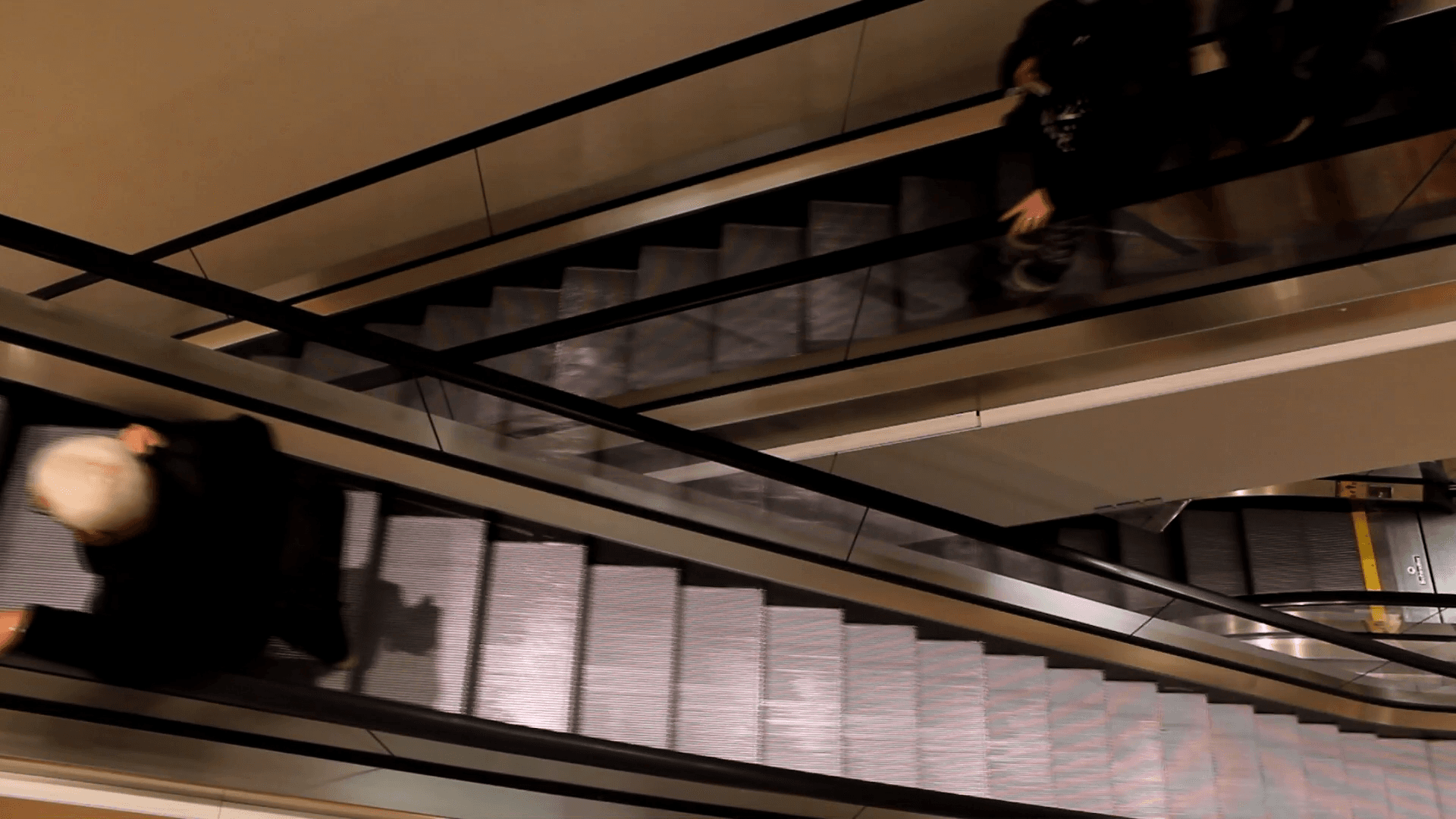 Flâneur — escaleras eléctricas
